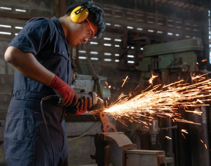 Engineer,Operating,Angle,Grinder,Hand,Tools,In,Manufacturing,Factory,-